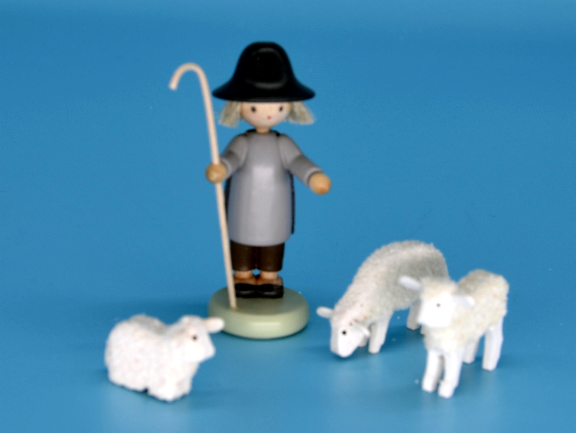 Hirte und drei Schafe