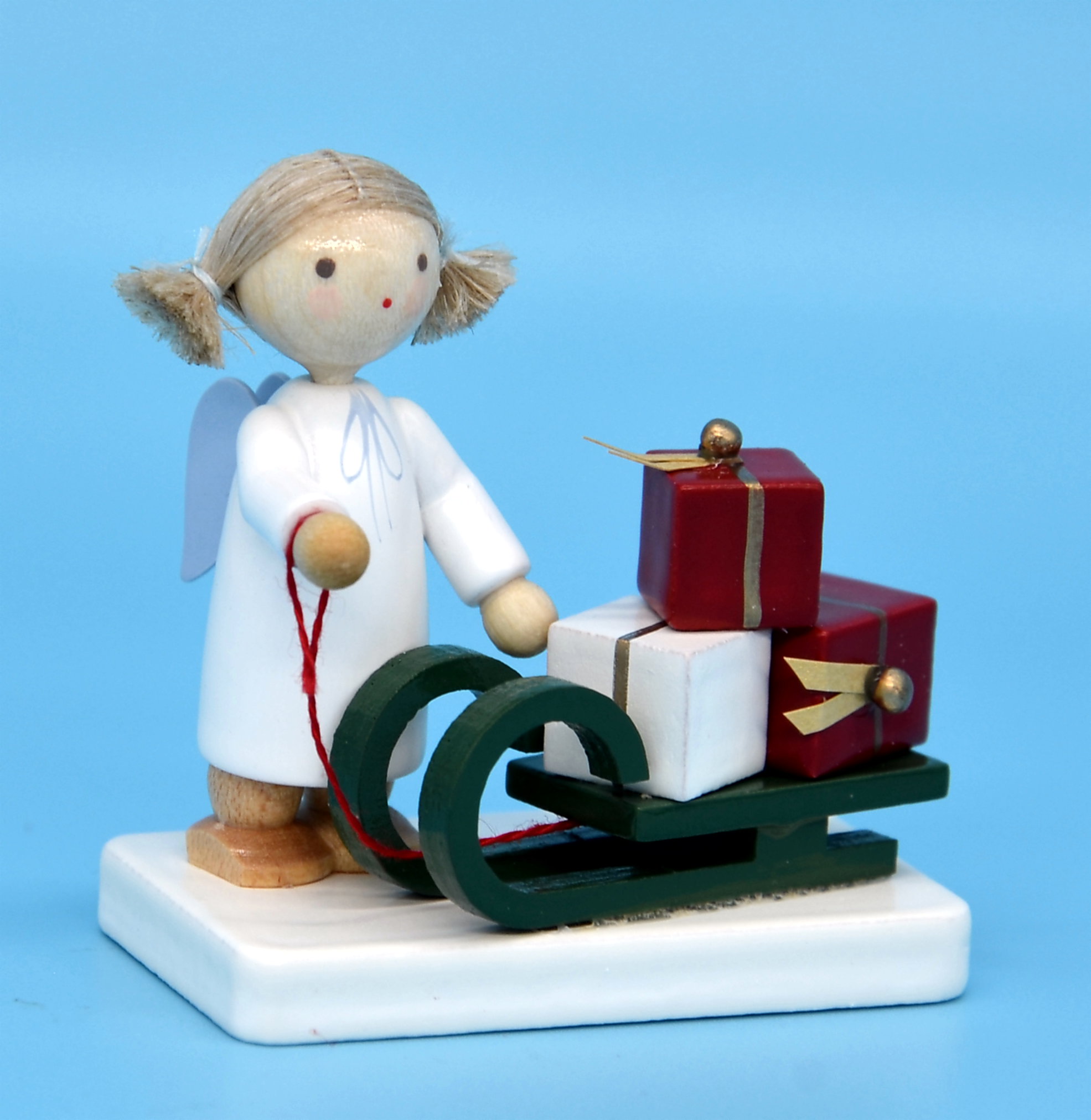 Engel mit Weihnachtsschlitten
