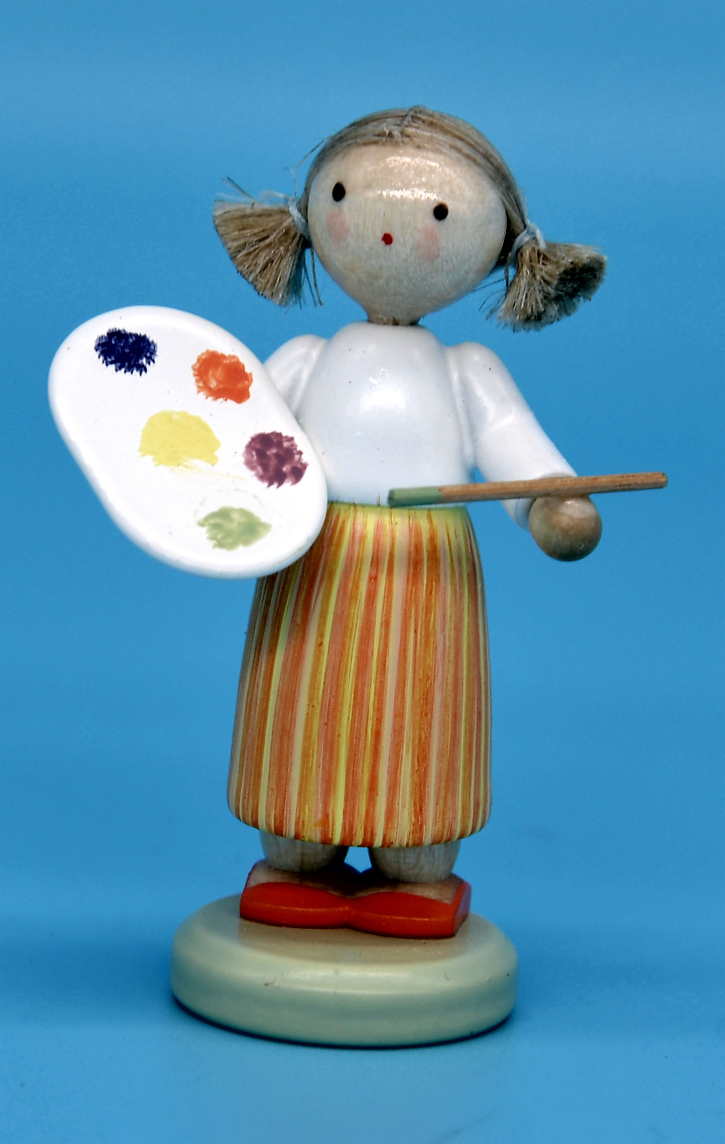 Mädchen mit Farbpalette