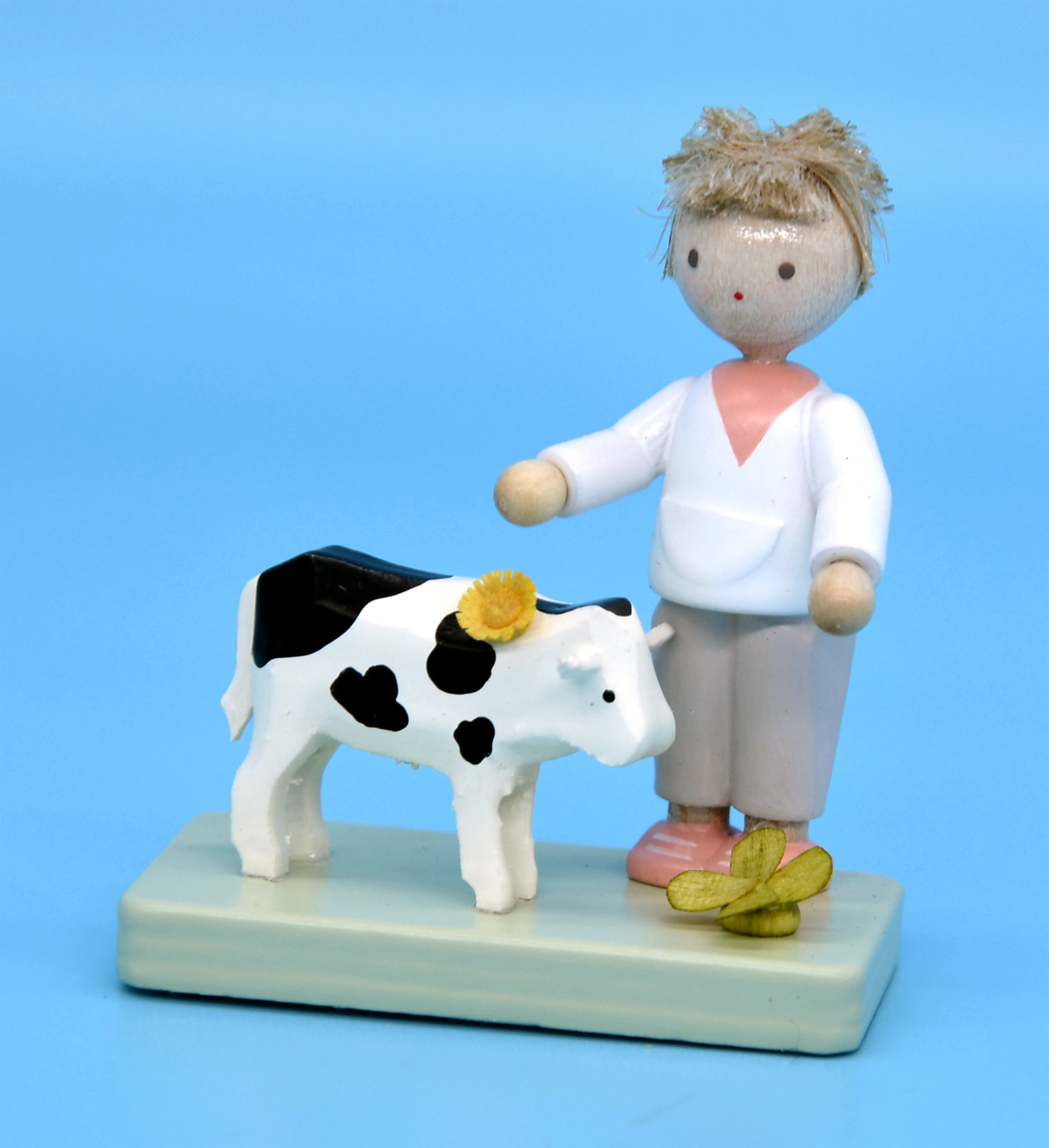 Junge mit Kälbchen