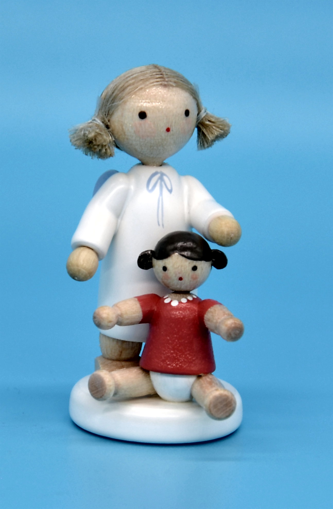 Engel mit Puppe