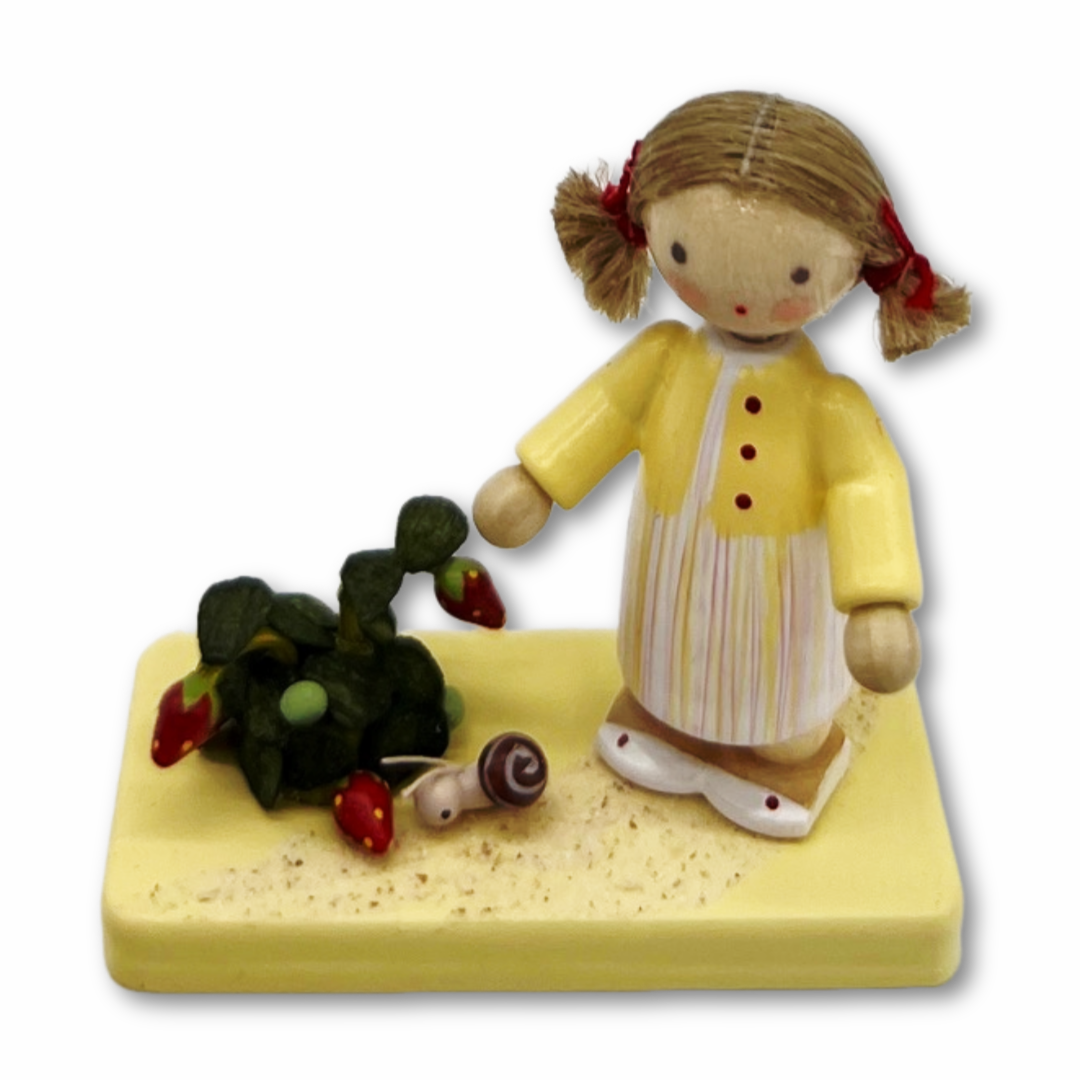 Mädchen mit Weinbergschnecke