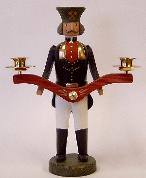 Bergmann mit Messingkerzenhaltern