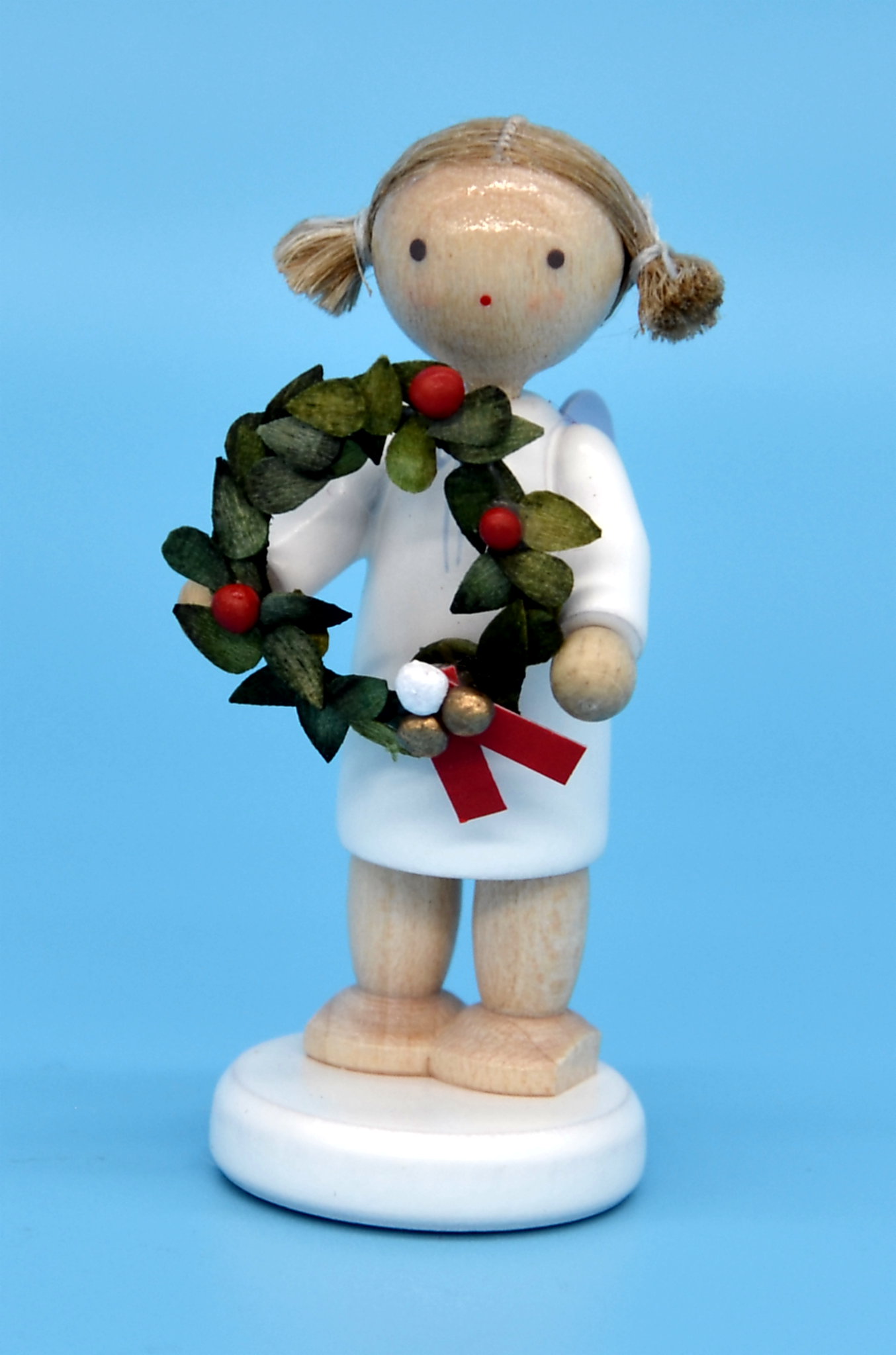 Engel mit Weihnachtskranz
