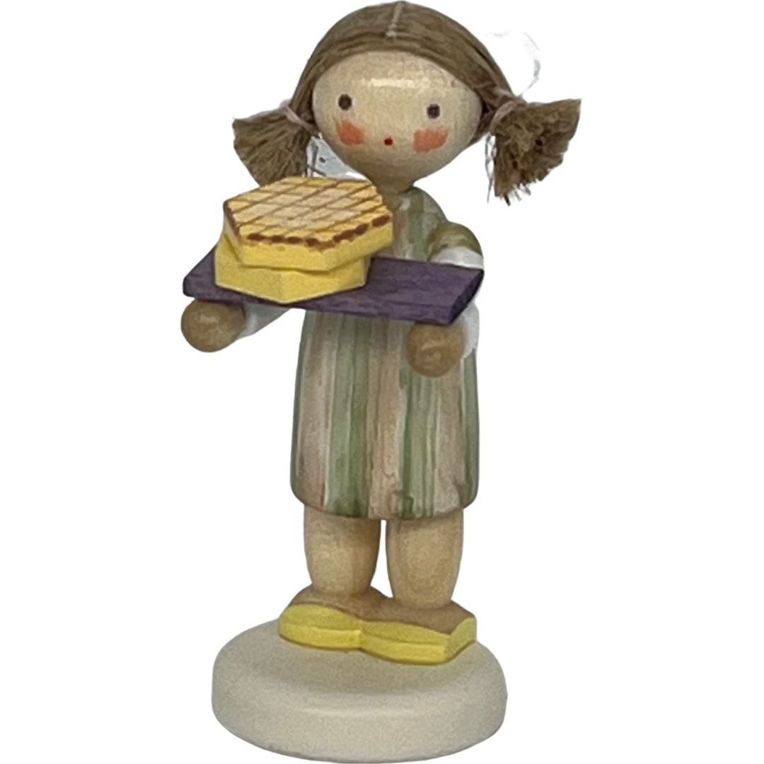 Mädchen mit Honigwaffeln