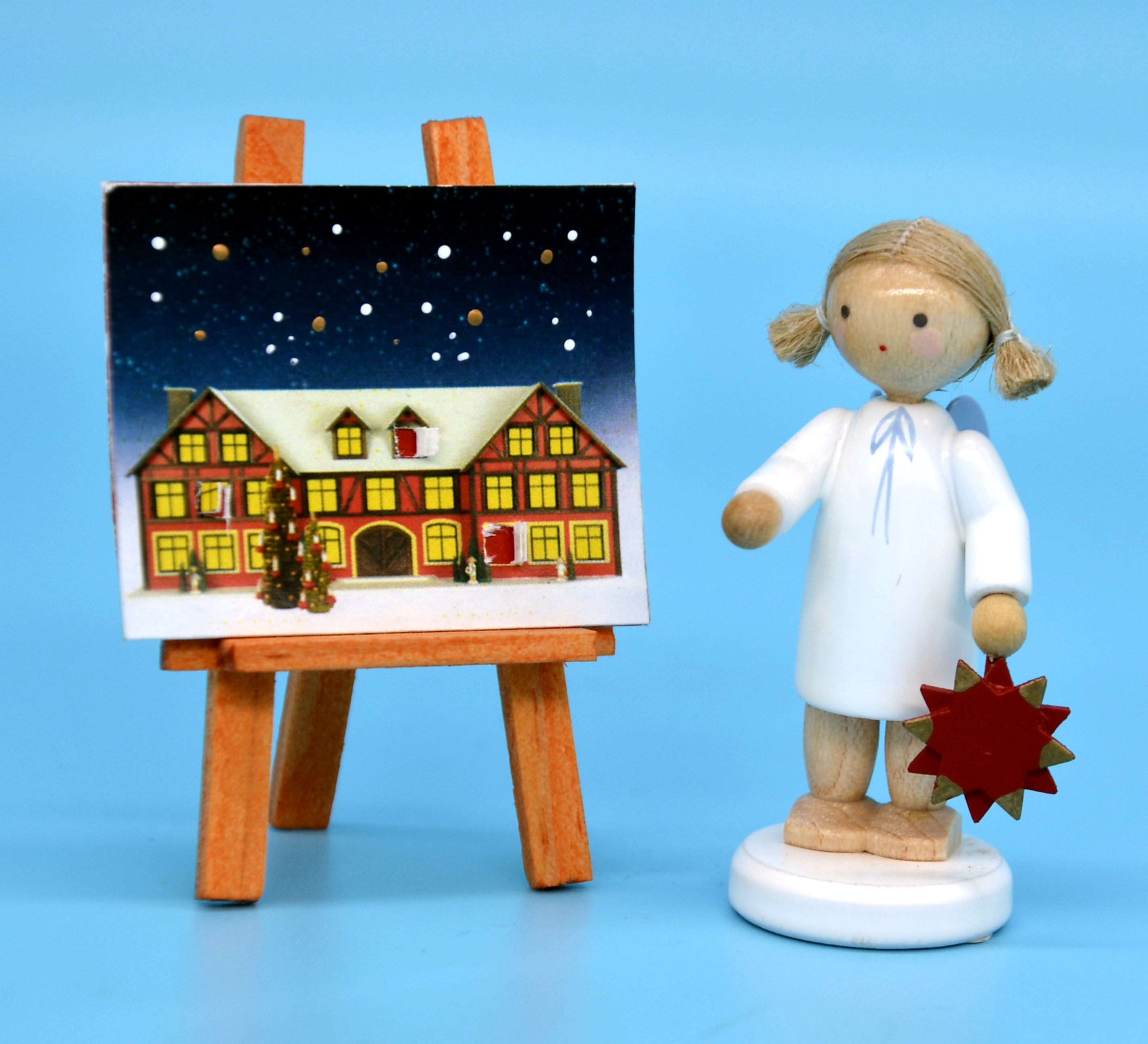 Engel mit Adventsstern und Adventskalender